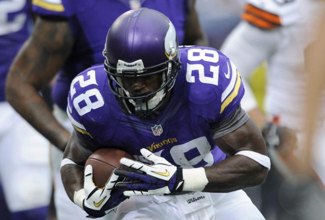 Hi-res-181693293-adrian-peterson-of-the-minnesota-vikings-carries-the_crop_north