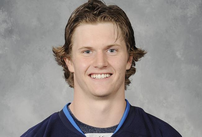 Hi-res-181688190-jacob-trouba-of-the-winnipeg-jets-poses-for-his_crop_north