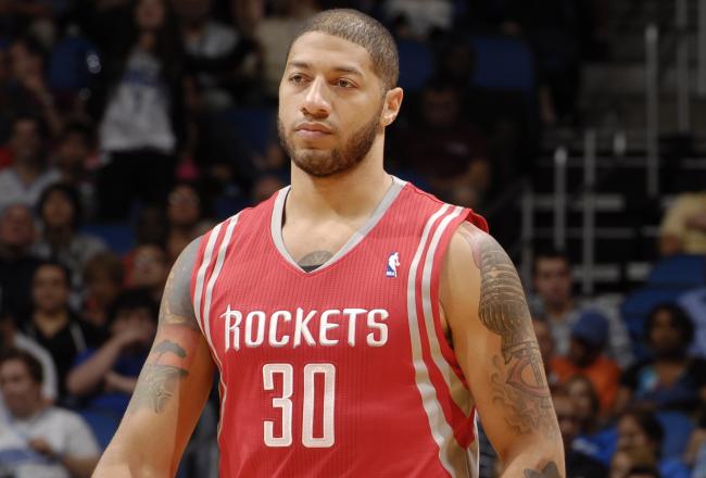 Hi-res-154817269-royce-white-of-the-houston-rockets-and-donatas_crop_north