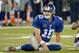 Sep 15, 2013; East Rutherford, NJ, USA; New York Giants quarterback Eli Manning (10) reacts after an incomplete pass against the Denver Broncos during the game at MetLife Stadium. Mandatory Credit: Robert Deutsch-USA TODAY Sports