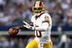 ARLINGTON, TX - NOVEMBER 22: Robert Griffin III #10 of the Washington Redskins throws the ball against the Dallas Cowboys during a Thanksgiving Day game at Cowboys Stadium on November 22, 2012 in Arlington, Texas. (Photo by Ronald Martinez/Getty Images)
