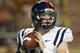 AUSTIN, TX - SEPTEMBER 14: Bo Wallace #14 of the Mississippi Rebels drops back to pass against the Texas Longhorns on September 14, 2013 at Darrell K Royal-Texas Memorial Stadium in Austin, Texas. (Photo by Cooper Neill/Getty Images)