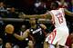 HOUSTON, TX - NOVEMBER 12: Dwyane Wade #3 of the Miami Heat passes against James Harden #13 of the Houston Rockets at the Toyota Center on November 12, 2012 in Houston, Texas. NOTE TO USER: User expressly acknowledges and agrees that, by downloading and or using this photograph, User is consenting to the terms and conditions of the Getty Images License Agreement. (Photo by Scott Halleran/Getty Images)