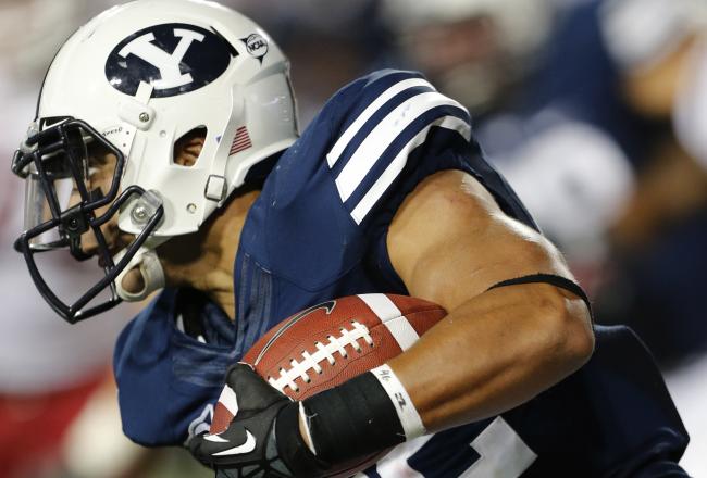 Hi-res-151357612-michael-alisa-of-byu-runs-the-ball-during-the_crop_north