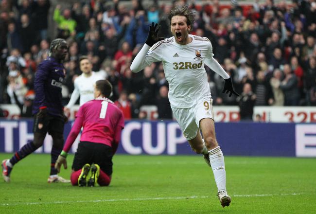 Hi-res-159031767-miguel-michu-of-swansea-city-celebrates-as-he-scores_crop_north