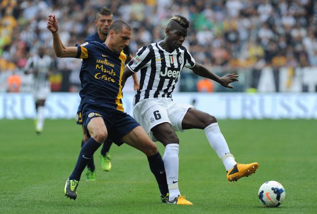 Hi-res-181997260-paul-pogba-of-juventus-is-tackled-by-romulo-souza-of_crop_north