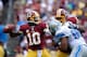 LANDOVER, MD - SEPTEMBER 22: Robert Griffin III #10 of the Washington Redskins throws a pass in the third quarter during a game against the Detroit Lions at FedExField on September 22, 2013 in Landover, Maryland. (Photo by Patrick McDermott/Getty Images)
