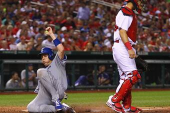 Hi-res-175813075-ellis-of-the-los-angeles-dodgers-scores-a-run-against_crop_north