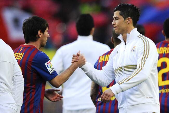 Hi-res-143221348-lionel-messi-of-fc-barcelona-and-cristiano-ronaldo-of_crop_north