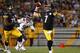 PITTSBURGH, PA - SEPTEMBER 22: Ben Roethlisberger #7 of the Pittsburgh Steelers attempts a pass out of the pocket against the Chicago Bears during the game on September 22, 2013 at Heinz Field in Pittsburgh, Pennsylvania. (Photo by Justin K. Aller/Getty Images)