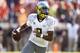 CHARLOTTESVILLE, VA - SEPTEMBER 7: Marcus Mariota #8 of the Oregon Ducks looks to throw a pass against the Virginia Cavaliers during the game at Scott Stadium on September 7, 2013 in Charlottesville, Virginia. (Photo by Joe Robbins/Getty Images)