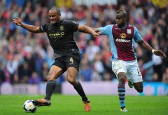 Hi-res-182110190-manchester-city-player-vincent-kompany-battles-for-the_crop_north