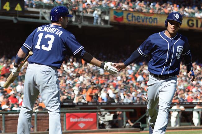 Hi-res-182173082-alexi-amarista-of-the-san-diego-padres-is-congratulated_crop_north