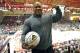 Nov 21, 2012; Denver, CO, USA; Denver Pioneers alumni Phil Heath poses for a photo during the game against the Colorado State Rams at the Magness Arena. The Rams defeated the Pioneers 60-53. Mandatory Credit: Ron Chenoy-USA TODAY Sports