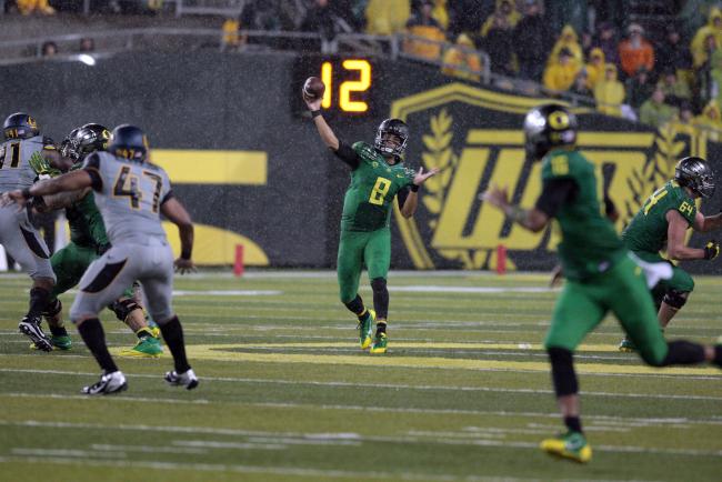Mariota throwing down the field to Addison.