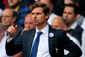182095772-andre-villas-boas-manager-of-tottenham-hotspur-signals_crop_north