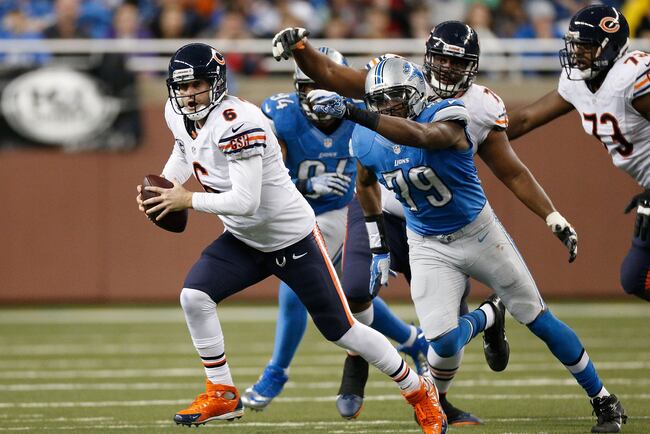 Hi-res-158819501-jay-cutler-of-the-chicago-bears-escapes-the-rush-of_crop_north