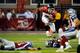MONTREAL, CANADA - JULY 12: Jon Cornish #9 of the Calgary Stampeders jumps to avoid a tackle by Chip Cox #11 of the Montreal Alouettes during the CFL game at Percival Molson Stadium on July 12, 2013 in Montreal, Quebec, Canada. (Photo by Richard Wolowicz/Getty Images)