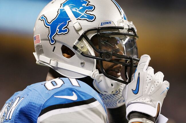 Hi-res-158819508-calvin-johnson-of-the-detroit-lions-straps-up-his_crop_north