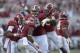Sep 28, 2013; Tuscaloosa, AL, USA; Alabama Crimson Tide defensive back Eddie Jackson (4) celebrates his interception with his teammates against the Mississippi Rebels during the first quarter at Bryant-Denny Stadium. Mandatory Credit: John David Mercer-USA TODAY Sports