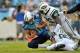 Sep 29, 2013; Nashville, TN, USA; Tennessee Titans quarterback Jake Locker (10) is sacked by New York Jets linebacker Antwan Barnes (95) and linebacker Antwan Barnes (95) during the first half at LP Field. Mandatory Credit: Jim Brown-USA TODAY Sports