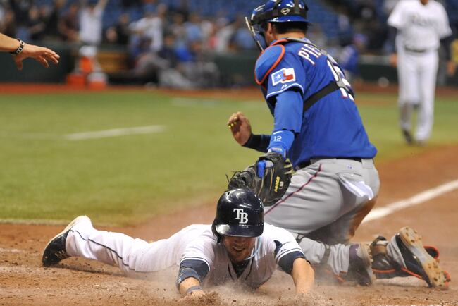 Hi-res-180986703-pinch-runner-sam-fuld-of-the-tampa-bay-rays-dives-for_crop_north