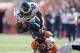 Sep 29, 2013; Denver, CO, USA; Denver Broncos free safety Rahim Moore (26) makes a tackle on Philadelphia Eagles running back LeSean McCoy (25) in the second quarter at Sports Authority Field at Mile High. Mandatory Credit: Ron Chenoy-USA TODAY Sports