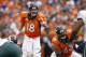 Sep 29, 2013; Denver, CO, USA; Denver Broncos quarterback Peyton Manning (18) signals at the line of scrimmage during the second half against the Philadelphia Eagles at Sports Authority Field at Mile High. Mandatory Credit: Chris Humphreys-USA TODAY Sports