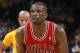 OAKLAND, CA - MARCH 15: Luol Deng #9 of the Chicago Bulls attempts a free throw against the Golden State Warriors on March 15, 2013 at Oracle Arena in Oakland, California. NOTE TO USER: User expressly acknowledges and agrees that, by downloading and or using this photograph, user is consenting to the terms and conditions of Getty Images License Agreement. Mandatory Copyright Notice: Copyright 2013 NBAE (Photo by Rocky Widner/NBAE via Getty Images)