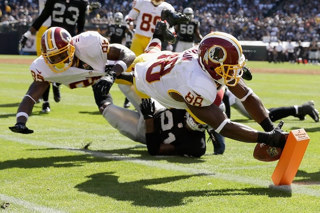 Redskins Lean on D, Beat Raiders for 1st Win