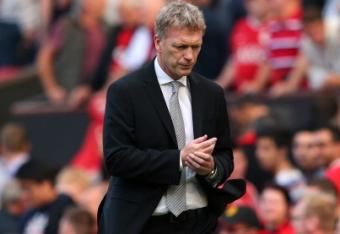 182110203-david-moyes-the-manager-of-manchester-united-leaves-the_crop_north