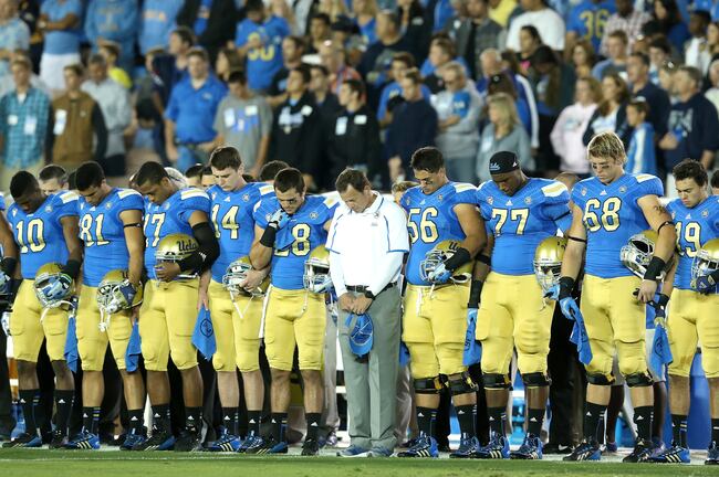Hi-res-181510577-head-coach-jim-mora-jr-of-the-ucla-bruins-stands-with_crop_north