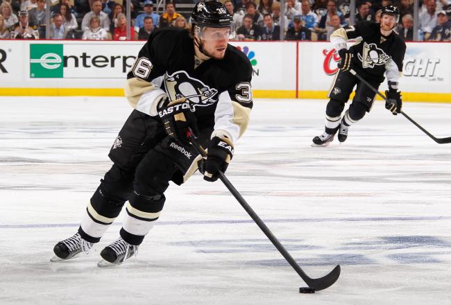 Hi-res-169970663-jussi-jokinen-of-the-pittsburgh-penguins-moves-the-puck_crop_north