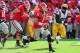 ATHENS, GA - SEPTEMBER 28: Aaron Murray #11 of the Georgia Bulldogs scrambles against the LSU Tigers at Sanford Stadium on September 28, 2013 in Athens, Georgia. (Photo by Scott Cunningham/Getty Images)