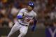 SAN FRANCISCO, CA - SEPTEMBER 25: Yasiel Puig #66 of the Los Angeles Dodgers rounds third base to score on an RBI double from Matt Kemp during the fourth inning against the San Francisco Giants at AT&T Park on September 25, 2013 in San Francisco, California. (Photo by Thearon W. Henderson/Getty Images)