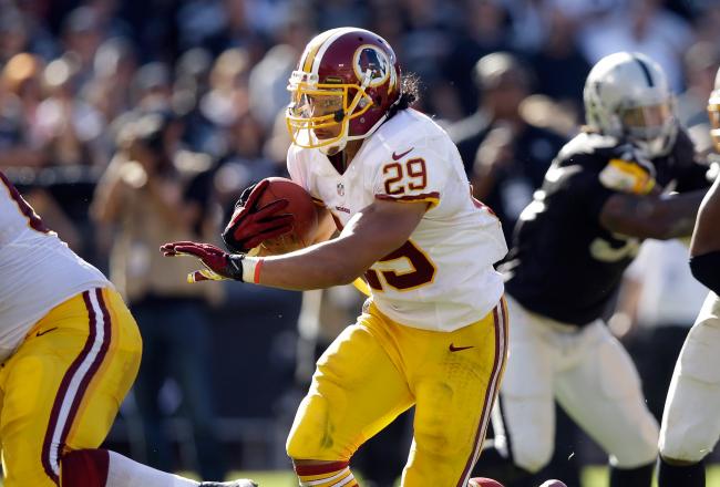 Hi-res-182407110-roy-helu-of-the-washington-redskins-runs-with-the-ball_crop_north