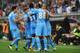 GENOA, ITALY - SEPTEMBER 28: Goran Pandev (C) of SSC Napoli celebrates with his team-mates after scoring the opening goal during the Serie A match between Genoa CFC and SSC Napoli at Stadio Luigi Ferraris on September 28, 2013 in Genoa, Italy. (Photo by Valerio Pennicino/Getty Images)