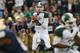 SOUTH BEND, IN - SEPTEMBER 21: Connor Cook #18 of the Michigan State Spartans looks for a receiver against the Notre Dame Fighting Irish at Notre Dame Stadium on September 21, 2013 in South Bend, Indiana. Notre Dame defeated Michigan State 17-13. (Photo by Jonathan Daniel/Getty Images)