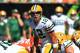 Sep 22, 2013; Cincinnati, OH, USA; Green Bay Packers quarterback Aaron Rodgers (12) at the line of scrimmage against the Cincinnati Bengals at Paul Brown Stadium. Mandatory Credit: Pat Lovell-USA TODAY Sports
