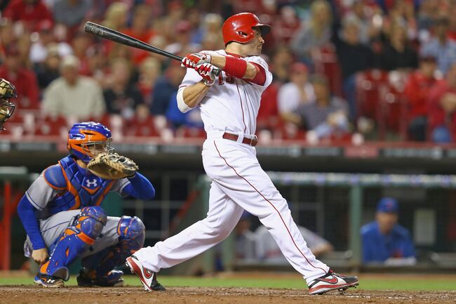 Hi-res-181758005-joey-votto-of-the-cincinnati-reds-swings-at-a-pitch-in_crop_north