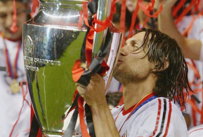 Hi-res-2035760-paolo-maldini-of-milan-celebrates-with-trophy-after_crop_north
