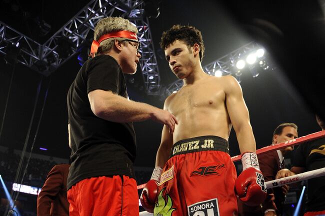 Hi-res-152058758-julio-cesar-chavez-jr-talks-with-coach-freddie-roach-in_crop_north