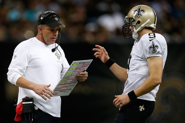 Hi-res-182567243-head-coach-sean-payton-talks-with-drew-brees-of-the-new_crop_north