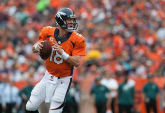 Hi-res-182444761-quarterback-peyton-manning-of-the-denver-broncos-rolls_crop_north