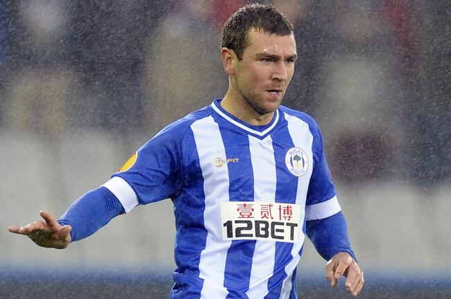 Hi-res-181790309-james-mcarthur-of-wigan-athletic-fc-in-action-during_crop_north