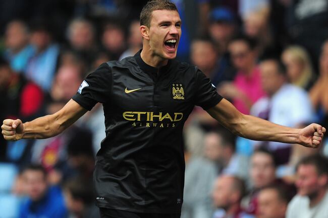 Hi-res-182107098-manchester-city-player-edin-dzeko-celebrates-after_crop_north