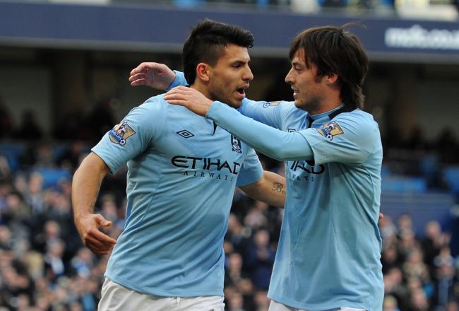 Hi-res-161847744-sergio-aguero-of-manchester-city-celebrates-scoring-his_crop_north
