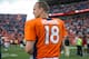 DENVER, CO - SEPTEMBER 29: Quarterback Peyton Manning #18 of the Denver Broncos walks off of the field after the win over the Philadelphia Eagles at Sports Authority Field Field at Mile High on September 29, 2013 in Denver, Colorado. (Photo by Dustin Bradford/Getty Images)