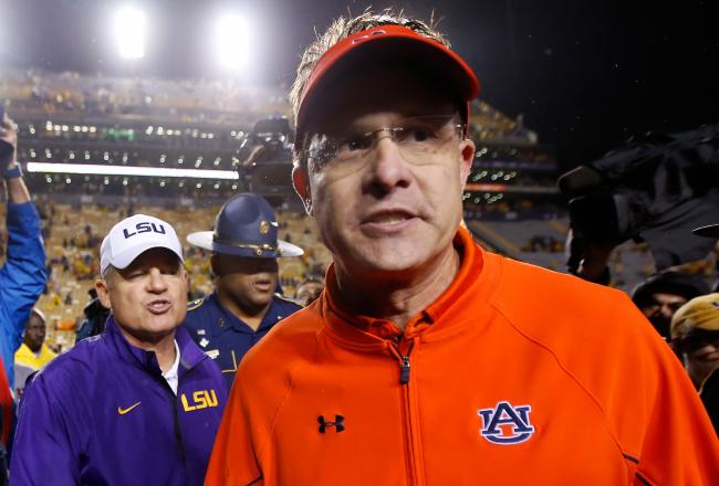 Hi-res-181502483-head-coach-les-miles-of-the-lsu-tigers-talks-with-ead_crop_north