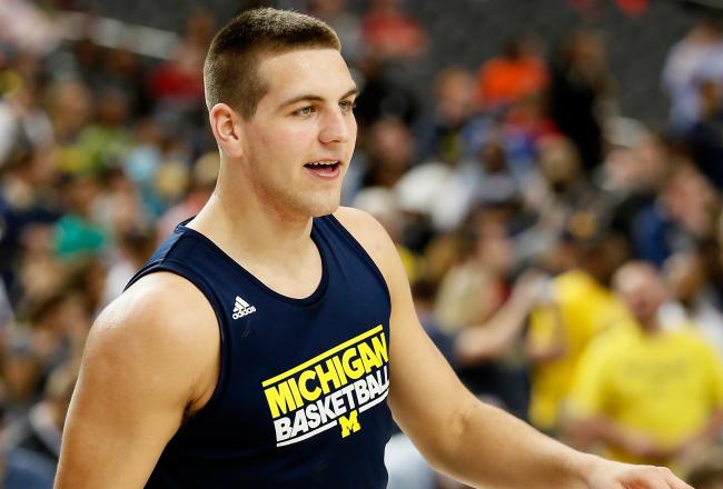 Hi-res-165705628-trey-burke-and-mitch-mcgary-of-the-michigan-wolverines_crop_north